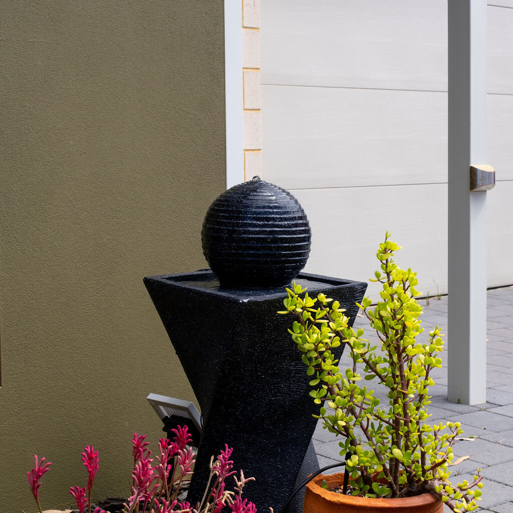 Water fountain symbolizing harmonious home energy flow - Residential Feng Shui